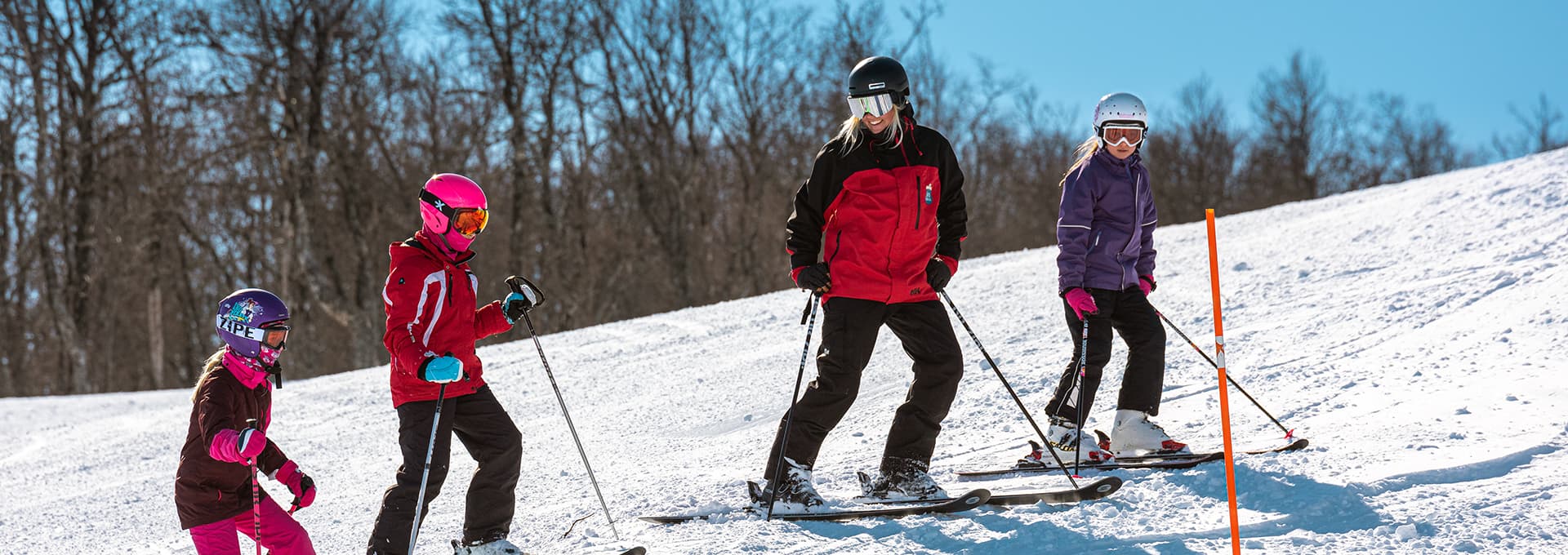 Ski instruction and children on the mountain