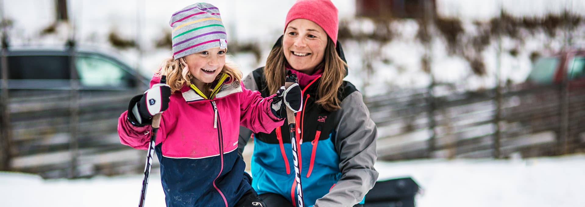 Child and ski instructor in action